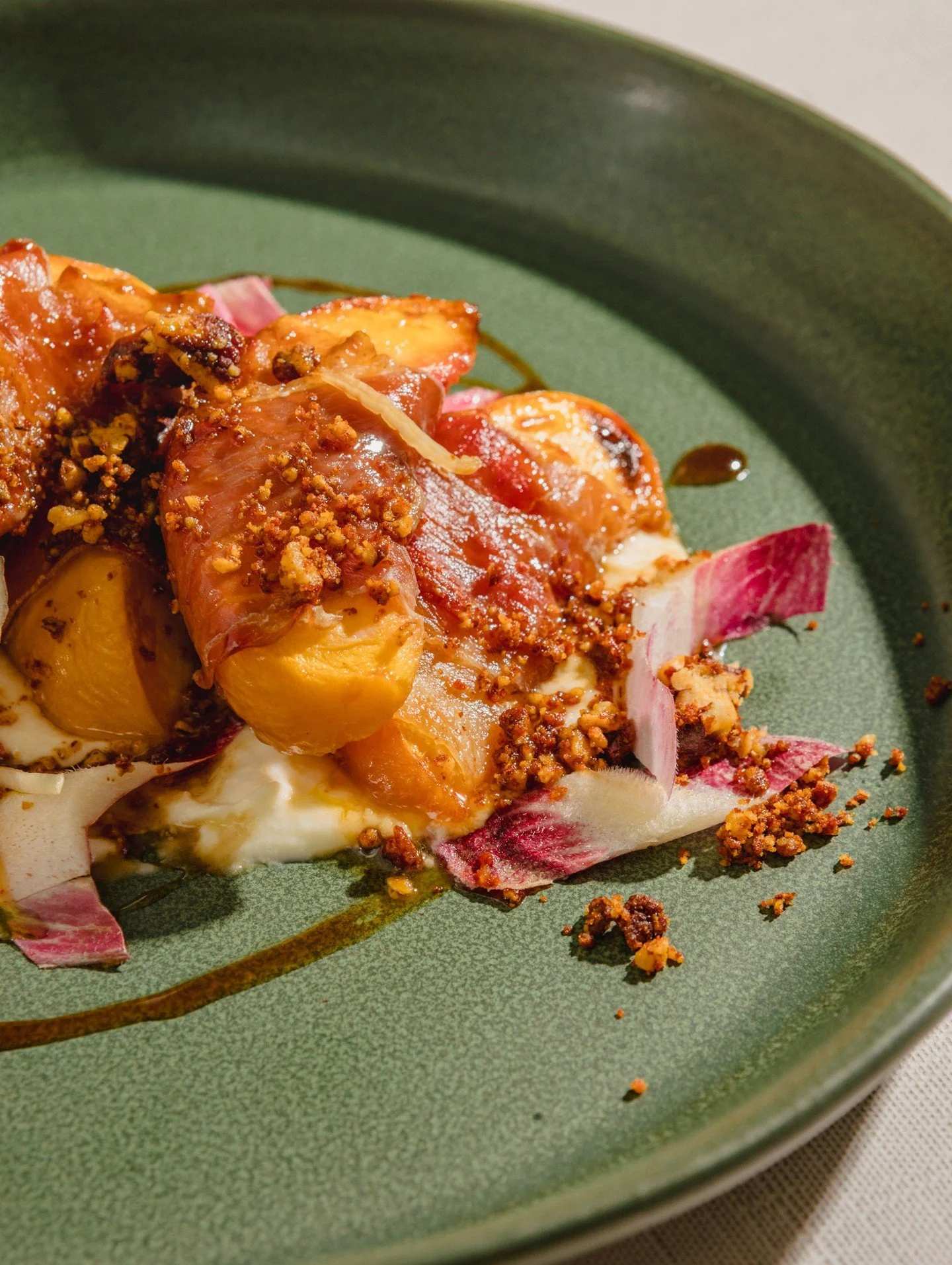 🍑 It's peach season, and what better time to get all dreamy-eyed about one of our all-time favorite @chefandthef dishes: Country Ham Wrapped Peaches.

This is a true Vivian classic, ripe, juicy peach wedges hand-wrapped in smoky country ham, roasted