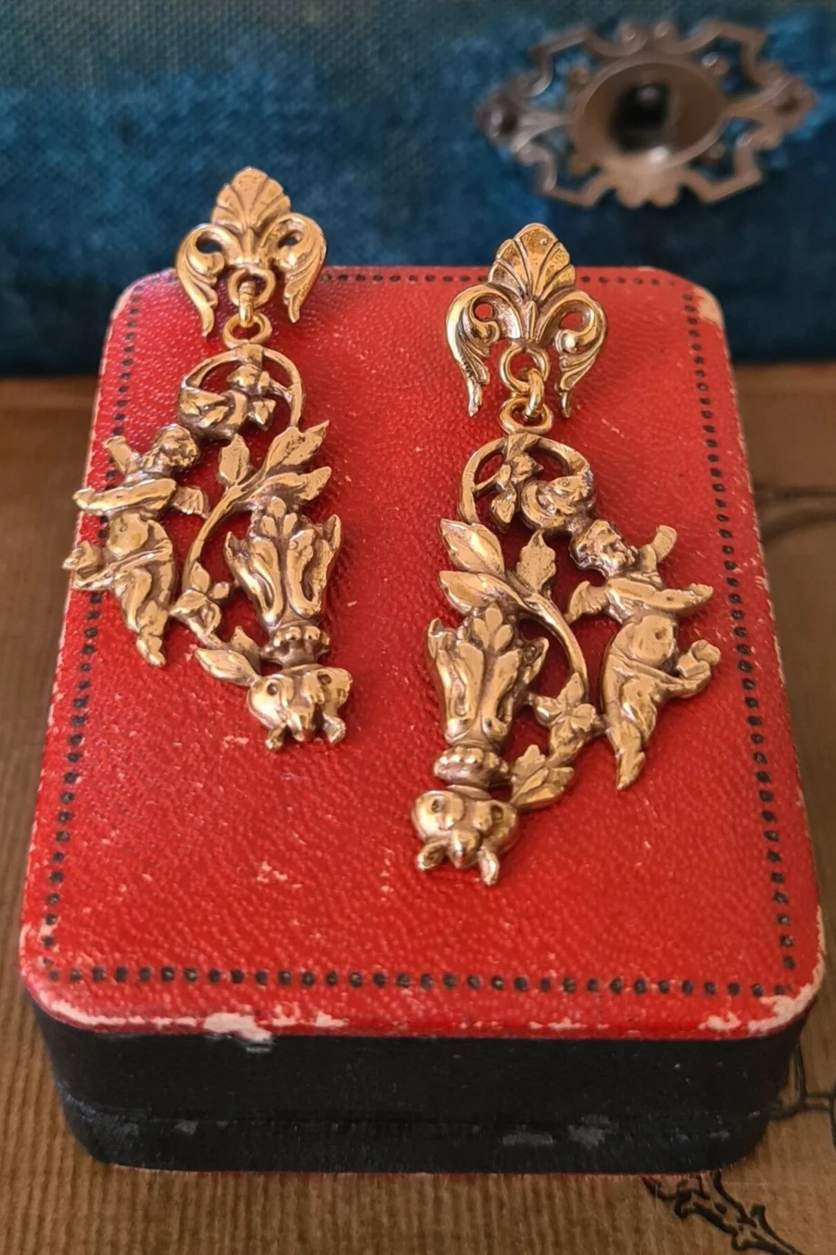 Orecchini putti