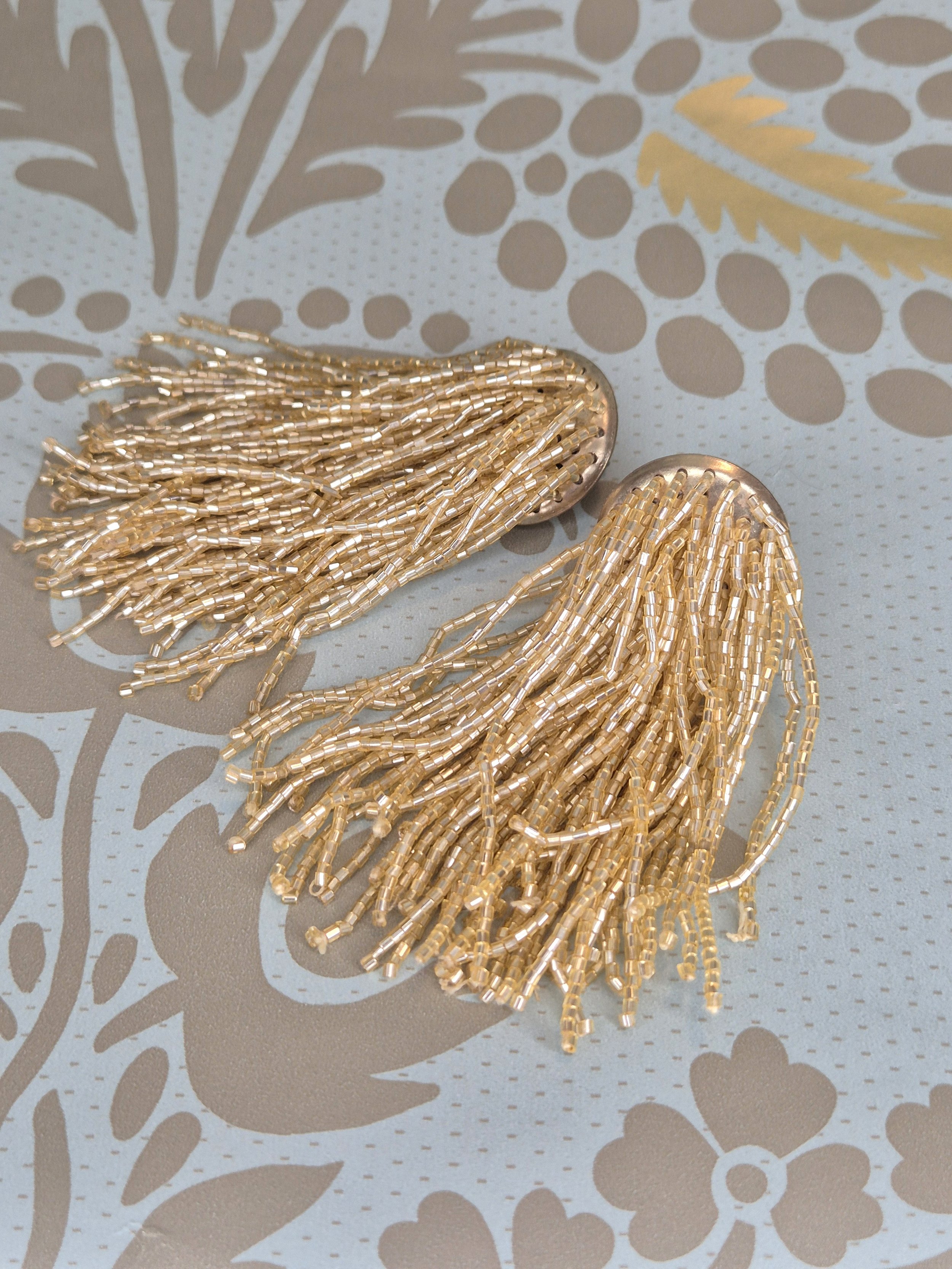 orecchini lunghi dorati