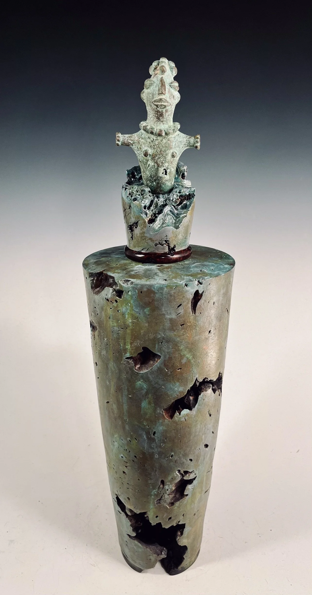 Buckeye Hollow Form with Copper and Bronze /African Figure