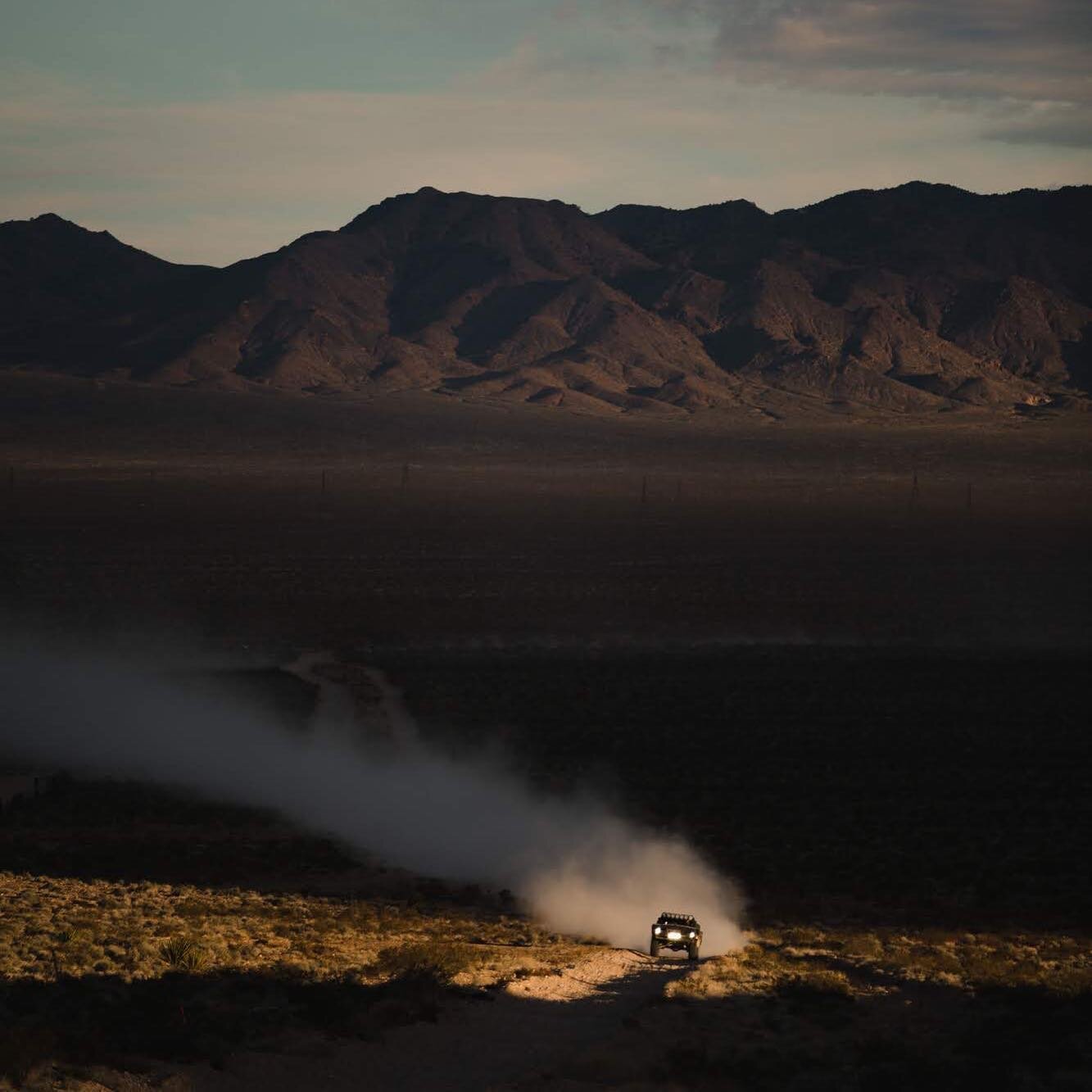 Mint 400 is next week. Needless to say we are pumped to go shoot it and tell awesome stories. 

This is a photo of @chris_isenhouer ripping up the main straight up to Pit B, a breathtaking sight as the aun sets on the valley. 

#mint400