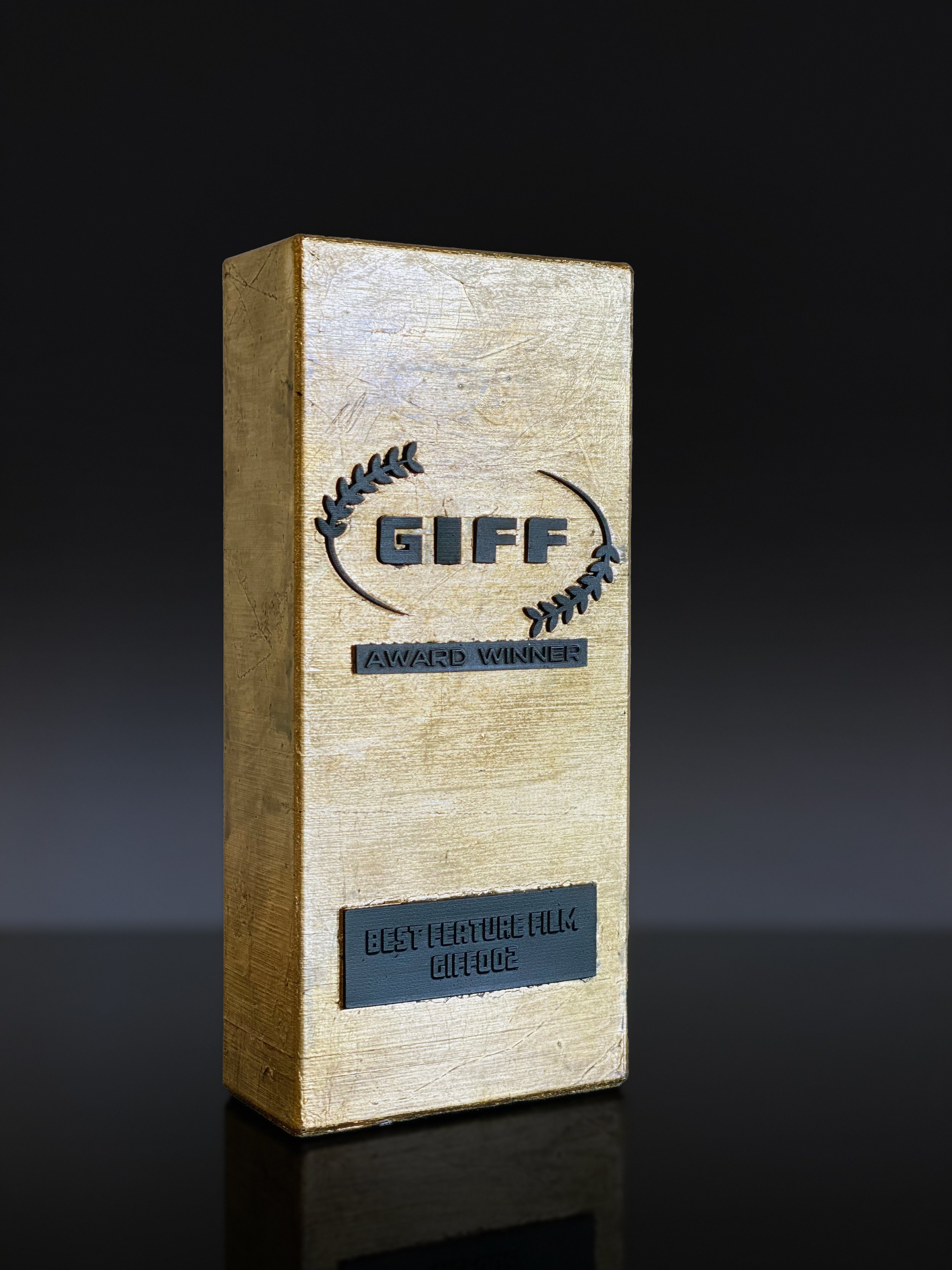 Photo of the finished GIFF002 gold award created by Phoenix Consultants for the Gloucester Independent Film Festival.
