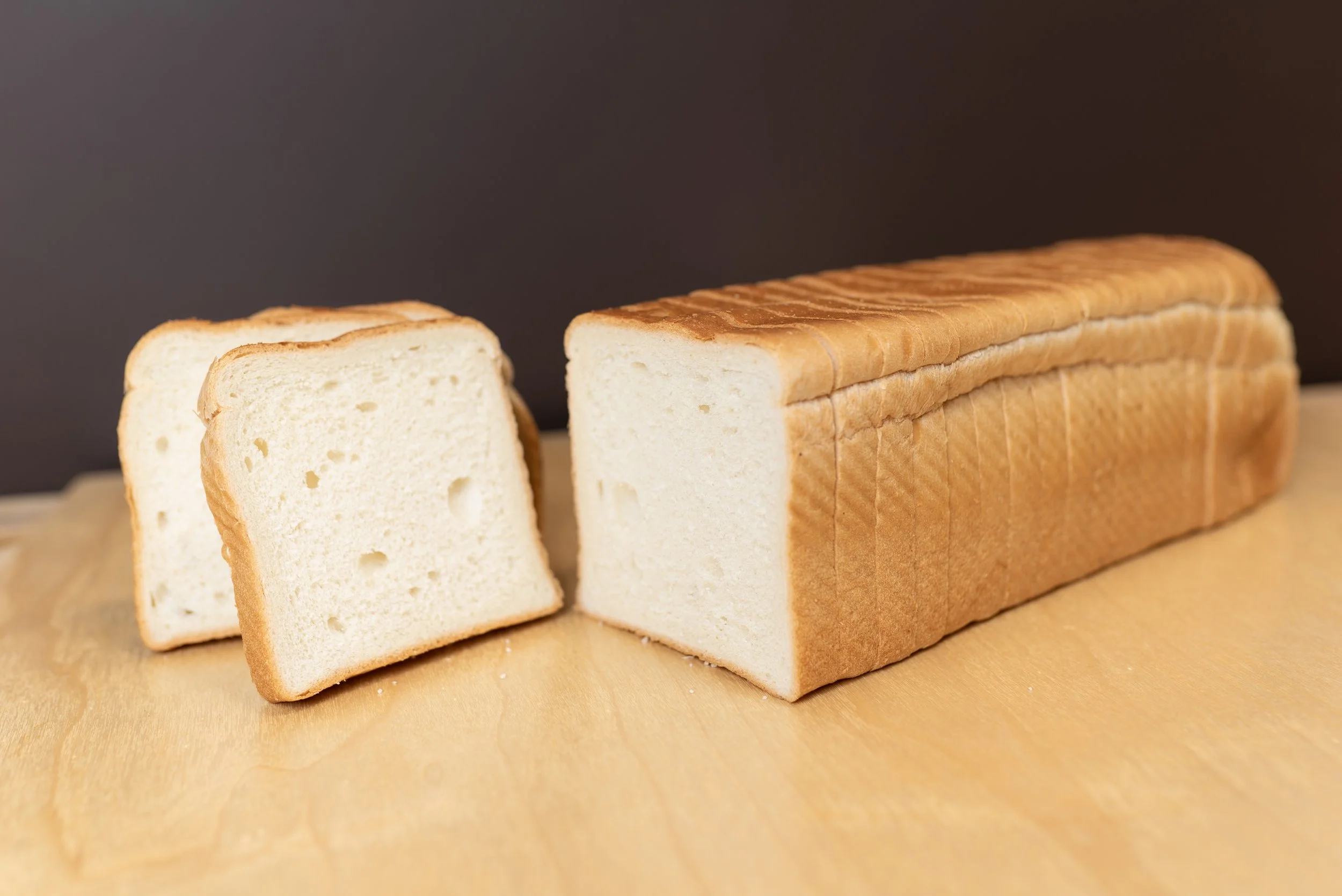 Our Milk White Bread, also known as Truman Loaf, is baked to a beautiful golden finish with a soft, fluffy interior and a delicate milky flavor—perfect for toast, sandwiches, breakfast, or simply enjoyed fresh by the slice.
