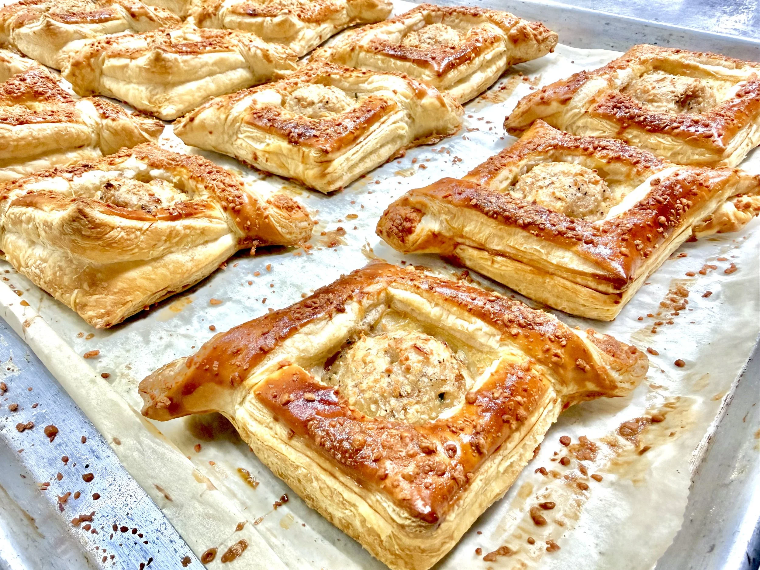 Our Chicken Alfredo Puff Pastry features tender seasoned chicken in a rich, creamy Alfredo sauce, wrapped in golden, flaky puff pastry and sprinkled with Parmesan cheese before baking for a deliciously savory, buttery finish.