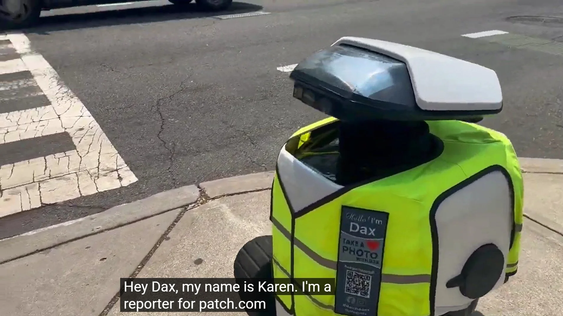 A reporter from patch.com tries to interview a Dax robot
