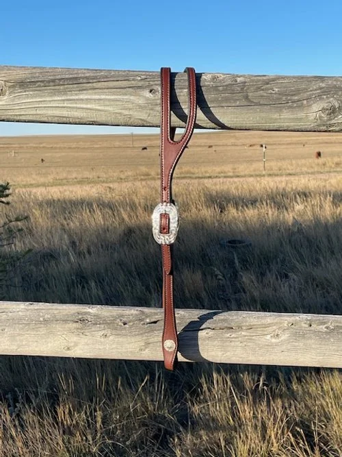 Split ear headstall, bridle horse style.  Veteran owned, small business.  Made from Wickett & Craig bridle leather.  Silver overlay conchos. Wyoming made.