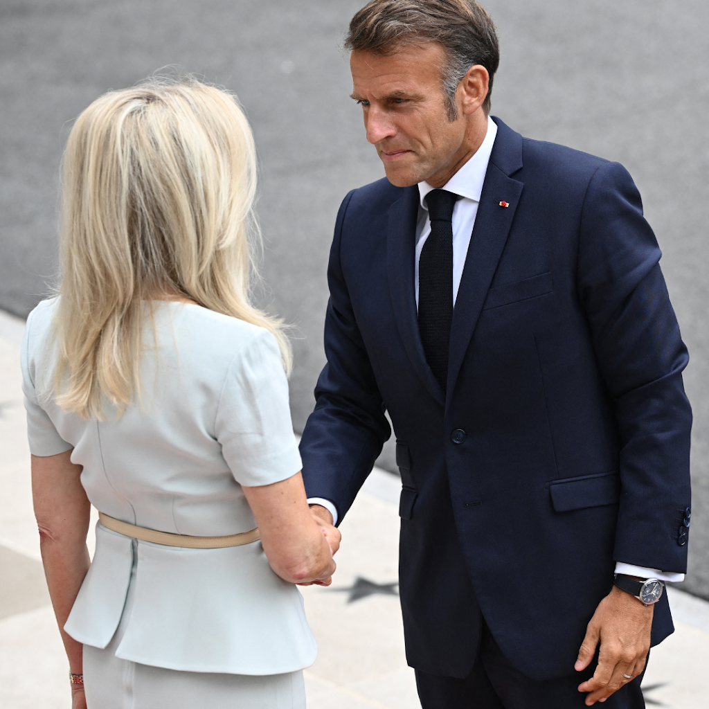 Greeting President of France Emmanuel Macron | Photo by Mandel Ngan/AFP