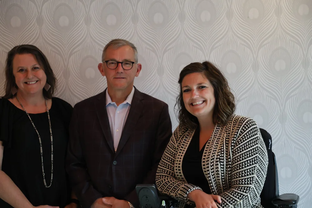  Grace and Dennis taking a photo together. 