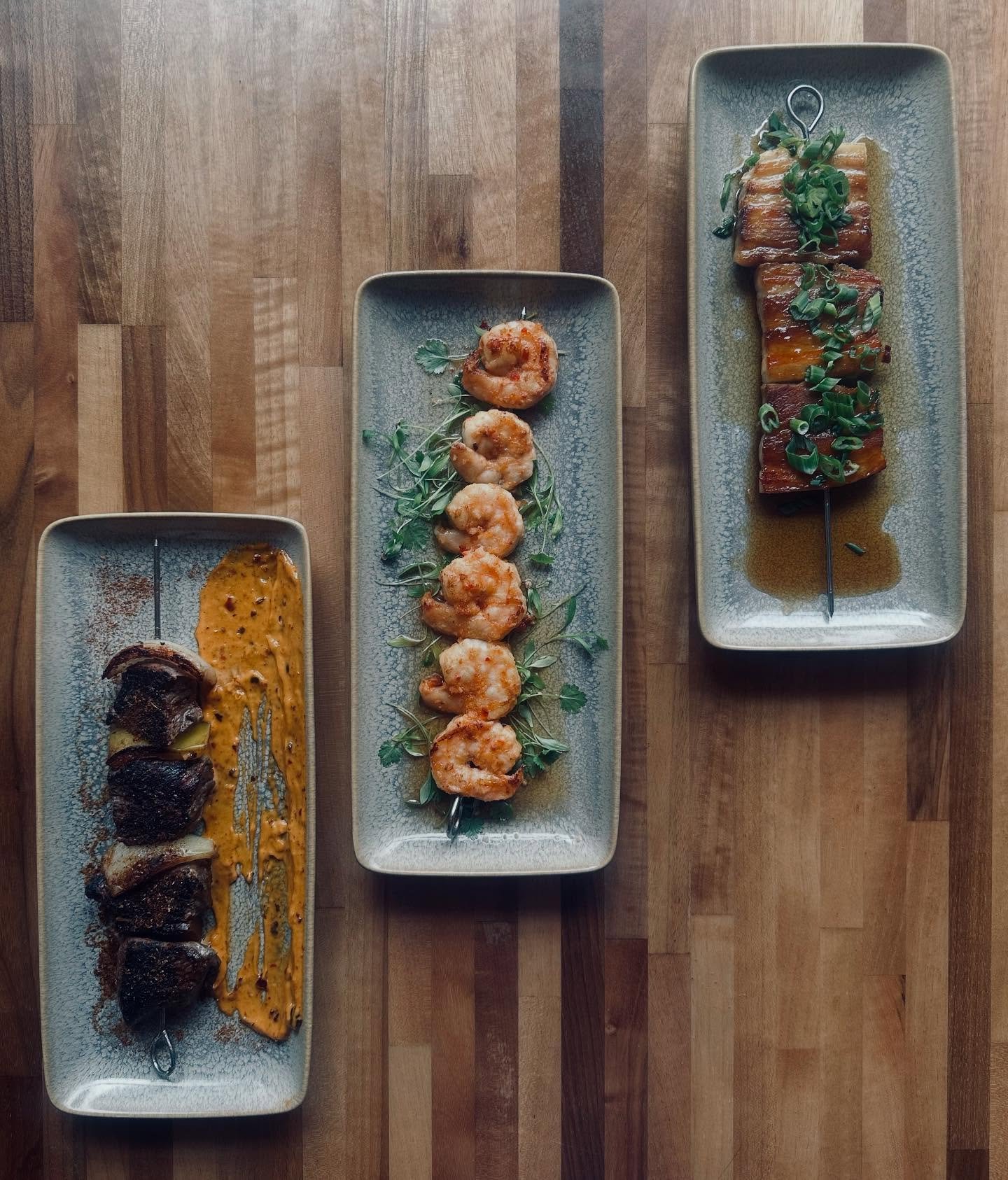 We are a cocktail bar, duh. But our food is ridiculous, unassuming, and highly unpretentious. It&rsquo;s just good food made really well. The skewers for example. Try the pork belly with maple bay glaze and scallions. Or steak marinaded with pineappl