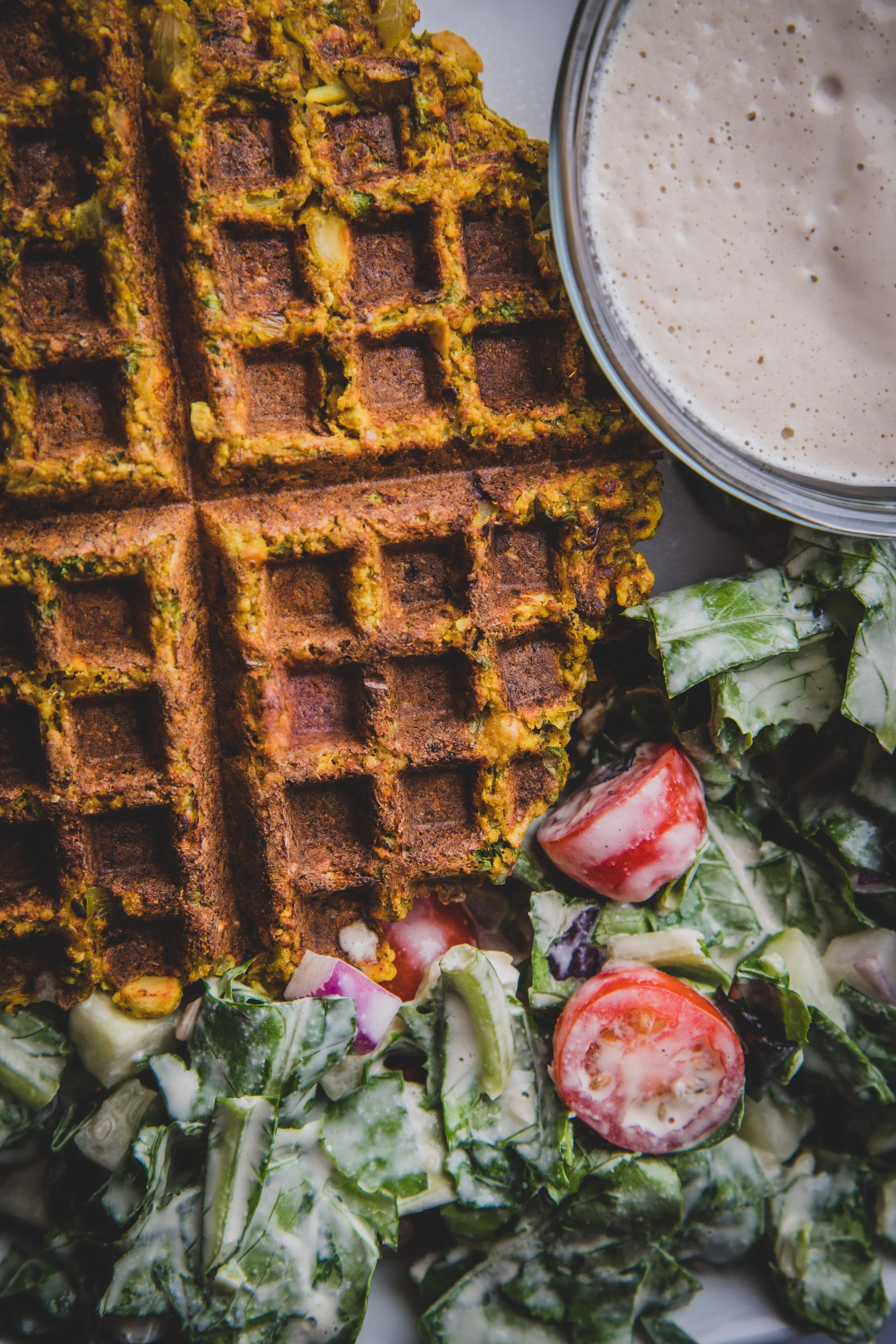 Falafel Waffles with Tomato Salad and Tahini Sauce