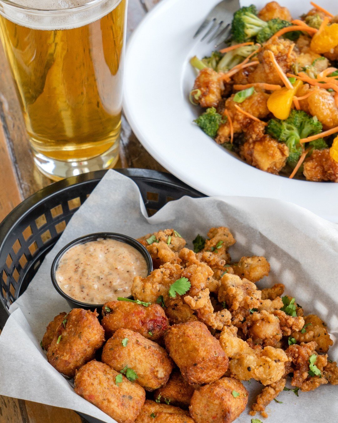 Our Calamari &amp; Crab Cakes dish is the best new item you'll sea all summer 😉