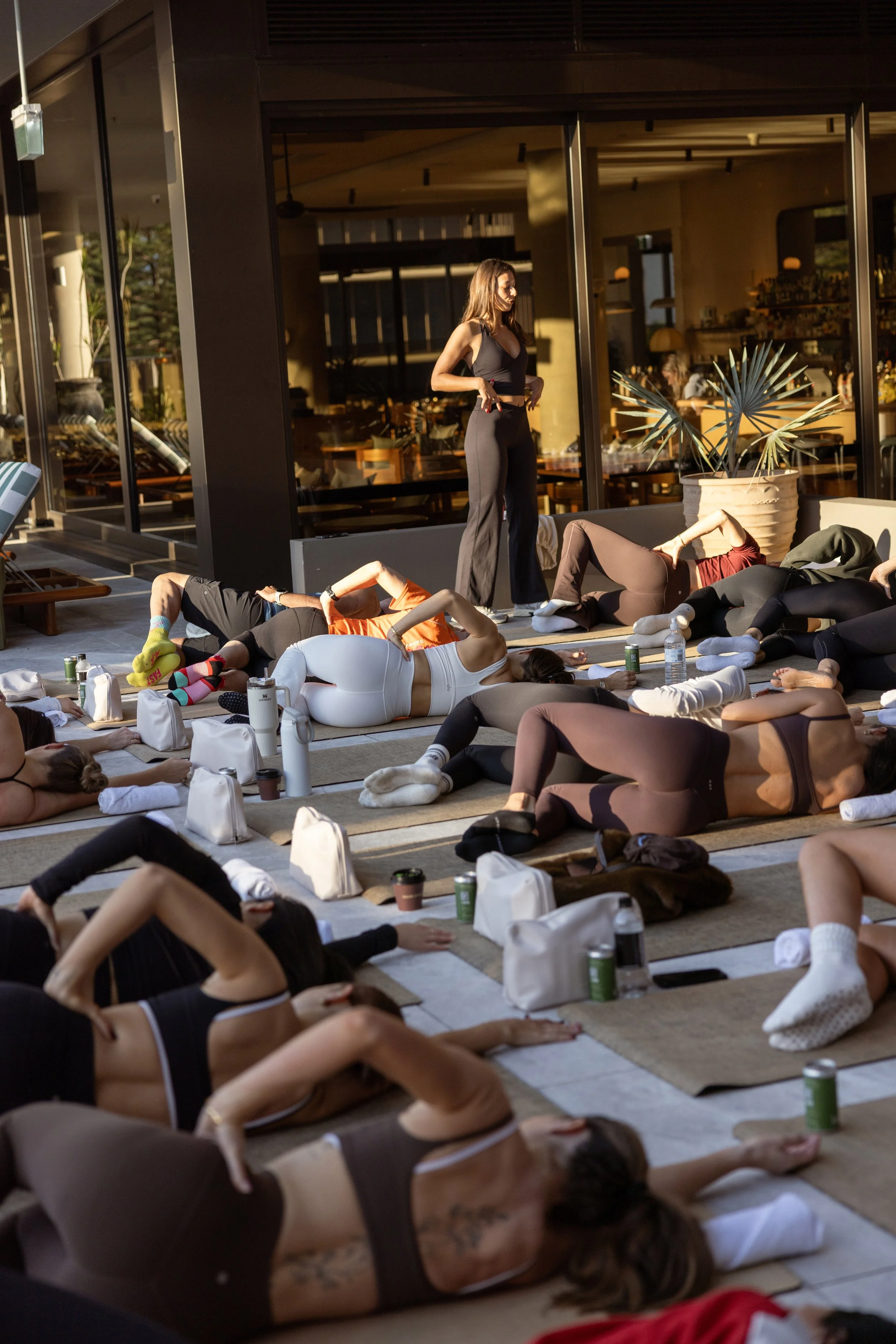 Editorial wellness retreat photography capturing a sunrise Pilates session on the Gold Coast.