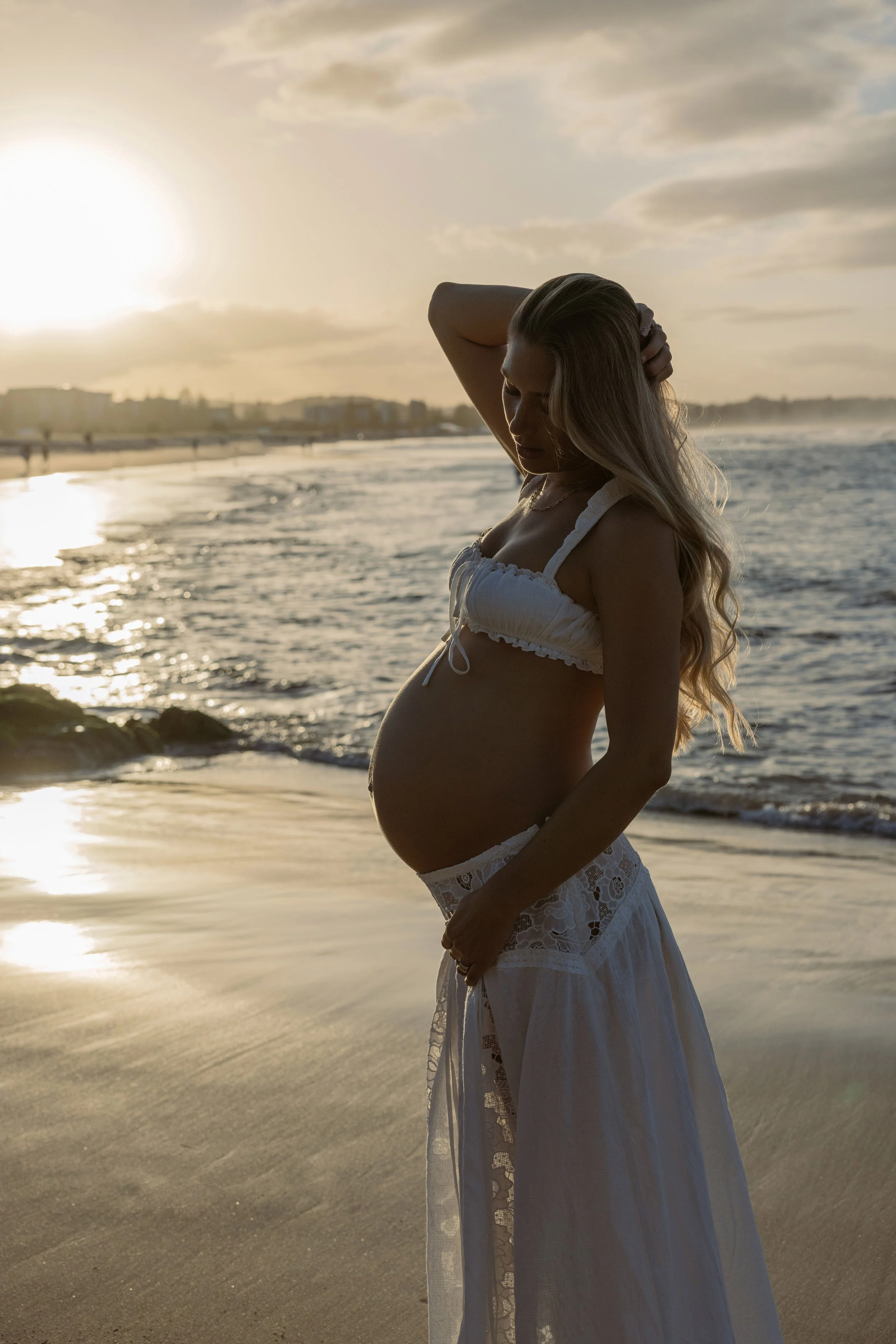 Candid motherhood photography session in natural light.