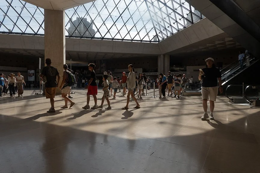 Louvre lobby floor, with shadows cast from above