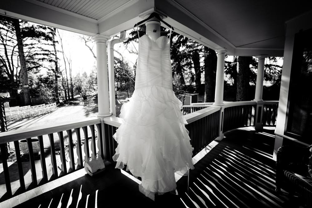  Tapestry House winter wedding by Fort Collins wedding photographer, JMGant Photography - Wedding Dress Hanging 