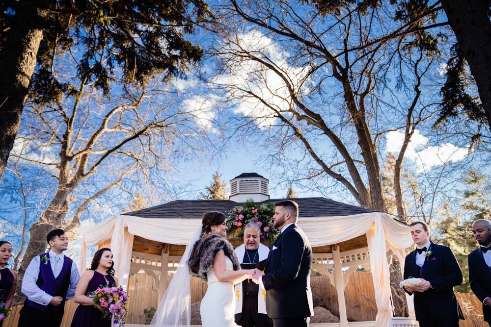  Wedding ceremony - Tapestry House winter wedding by Fort Collins wedding photographer, JMGant Photography 