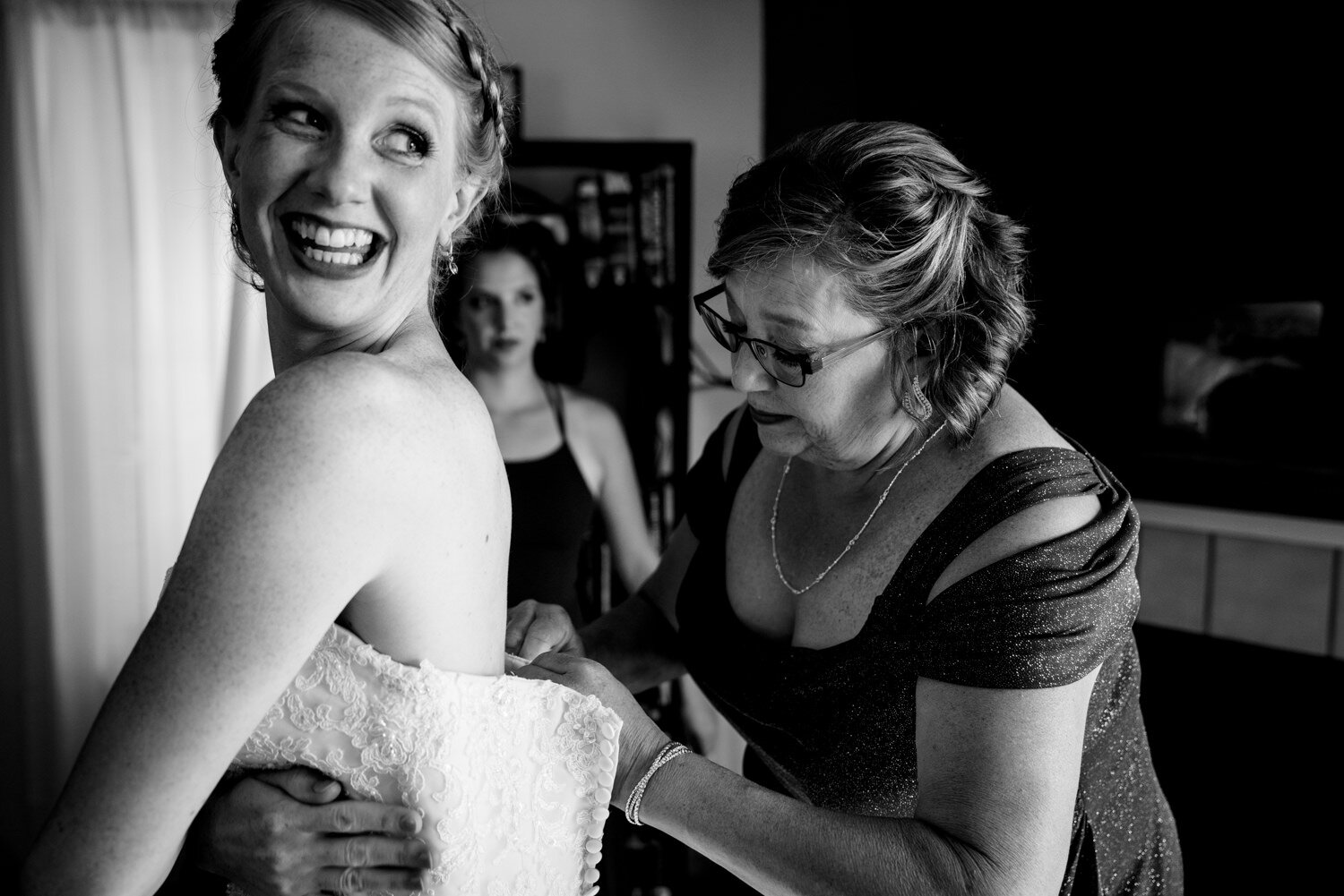  Getting ready for Boulder Colorado wedding at Sunrise Amphitheater by wedding photographer, JMGant Photography 