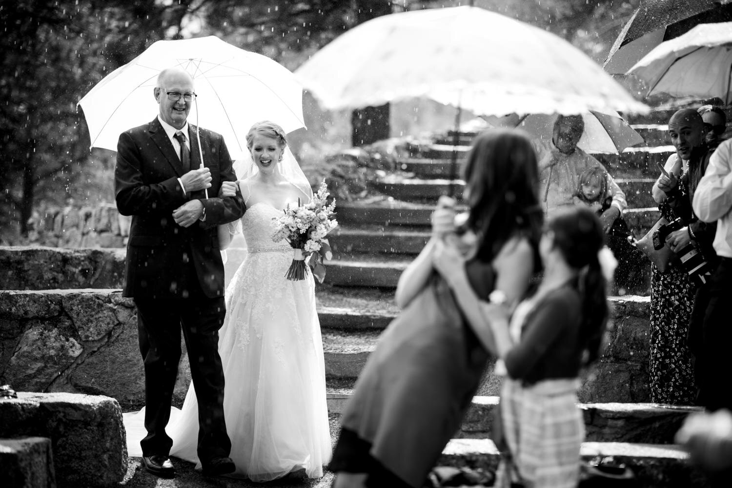  Rainy ceremony at Sunrise Amphitheater by wedding photographer, JMGant Photography 