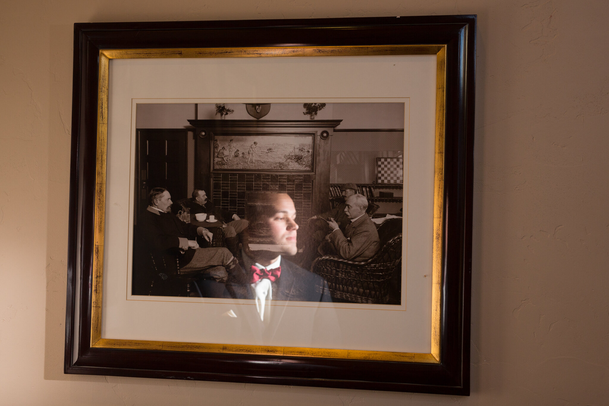  Creative reflective photo of groom in groom suite at Blackstone Country Club. Photograph by JMGant Photography. 