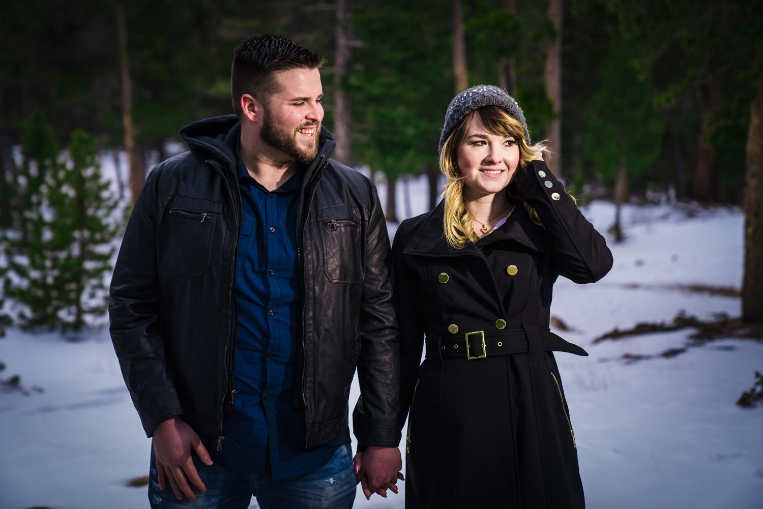  Snowy Estes Park Colorado engagement photos taken at Lily Lake in Rocky Mountain National. Photographed by JMGant Photography. 