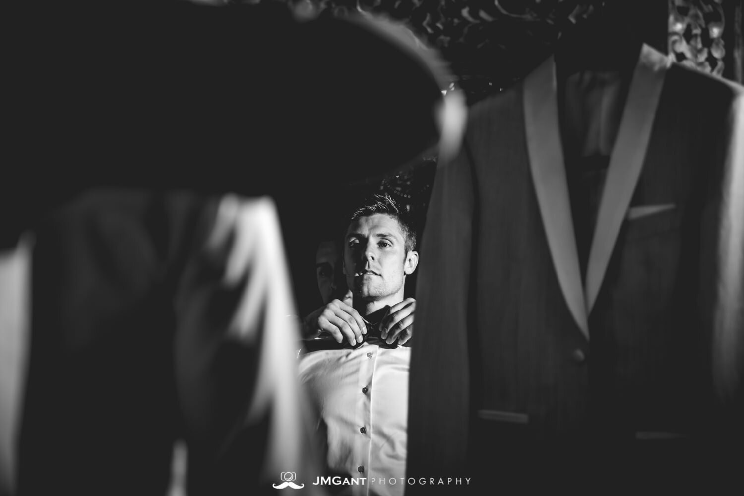  Denver Colorado Wedding | Groom getting dressed | Colorado wedding photographer | © JMGant Photography | http://www.jmgantphotography.com/ 