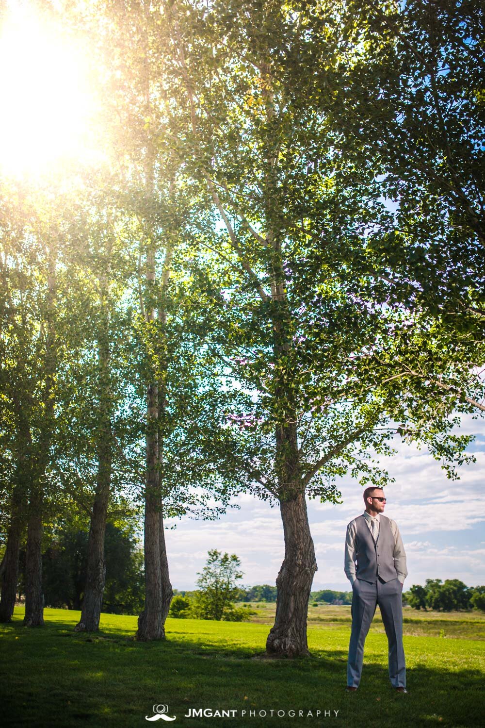  Platte River Fort Wedding | Groom wearing Ray Bans | Greeley Colorado wedding photographer | © JMGant Photography | http://www.jmgantphotography.com/ 