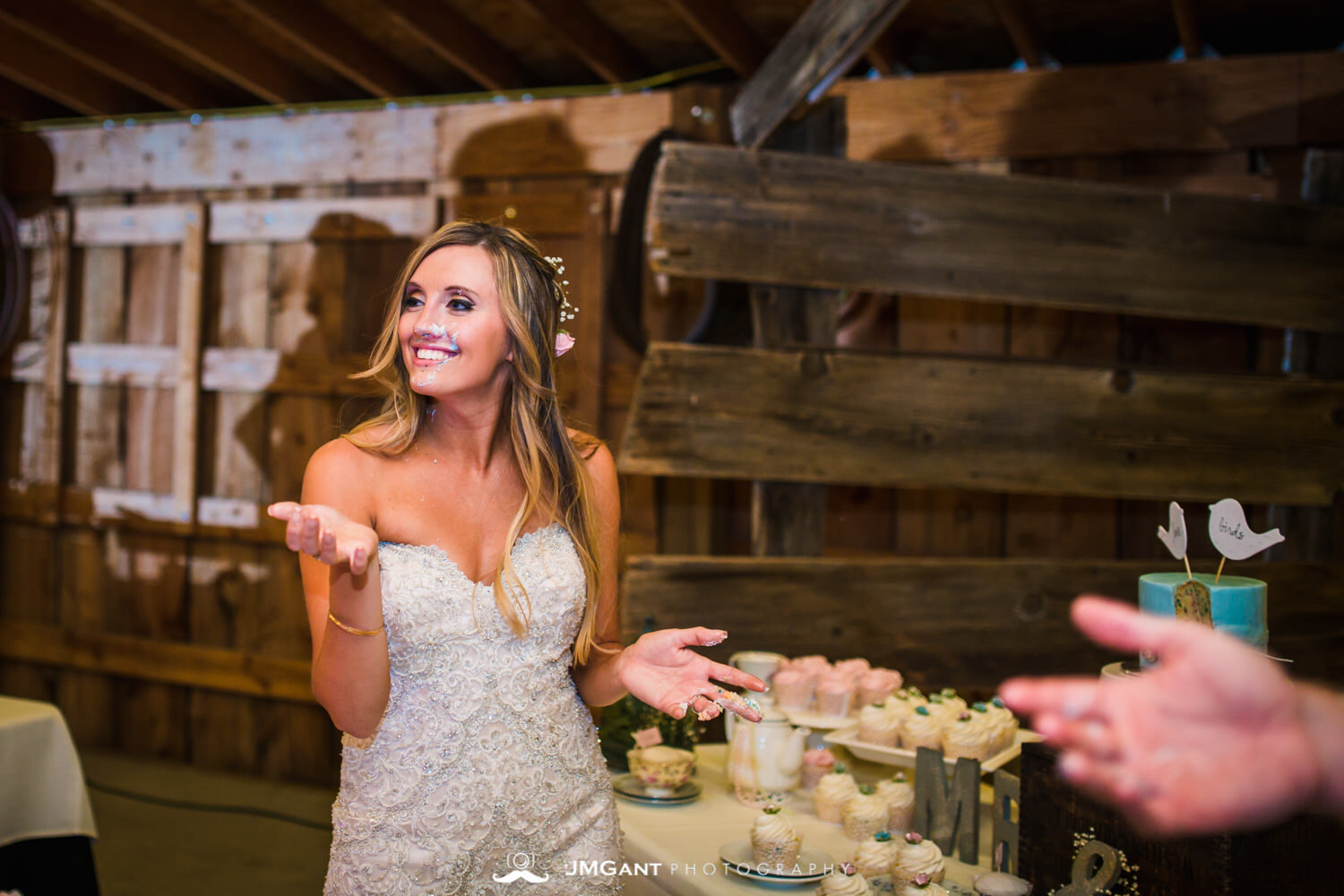  Platte River Fort Wedding | Cutting the cake | Greeley Colorado wedding photographer | © JMGant Photography | http://www.jmgantphotography.com/ 