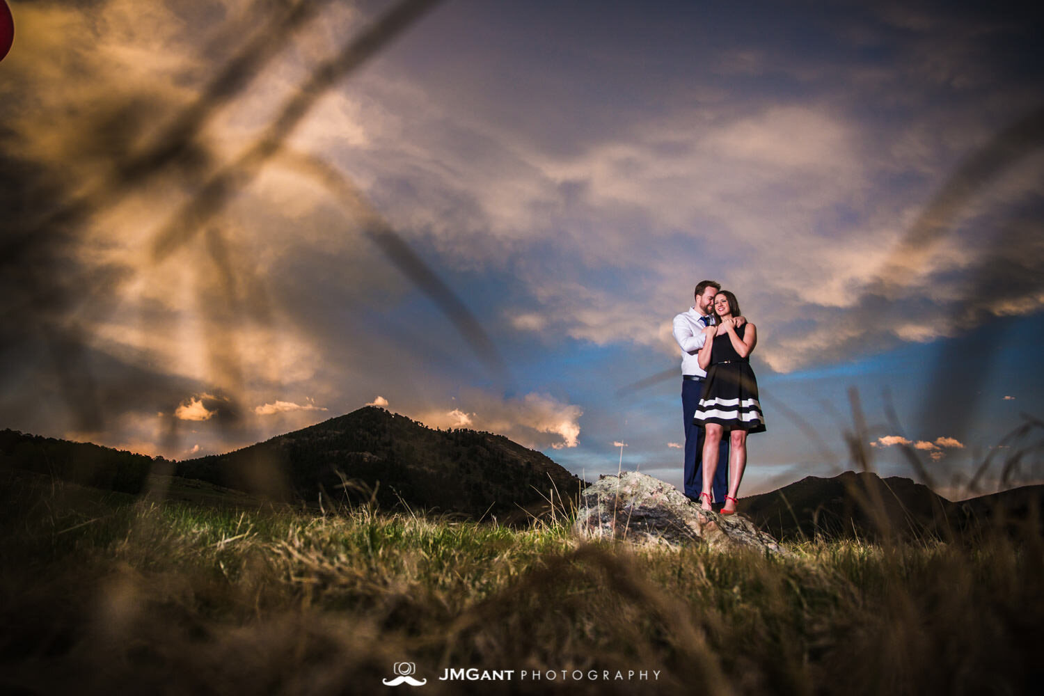  Incredibly colorful sunset at Rocky Mountain National Park during gorgeous Engagement Photography by JMGant Photography. 