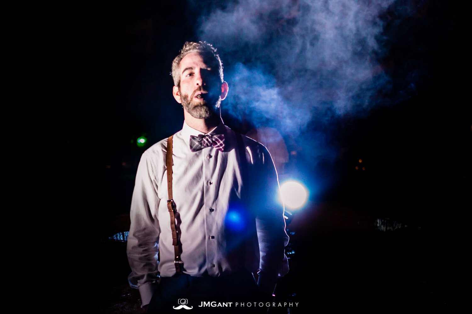  Incredible backlit cigar groom wedding portait, Winter Park, mountain wedding at the Lodge at Sunspot, photographed by JMGant Photography 