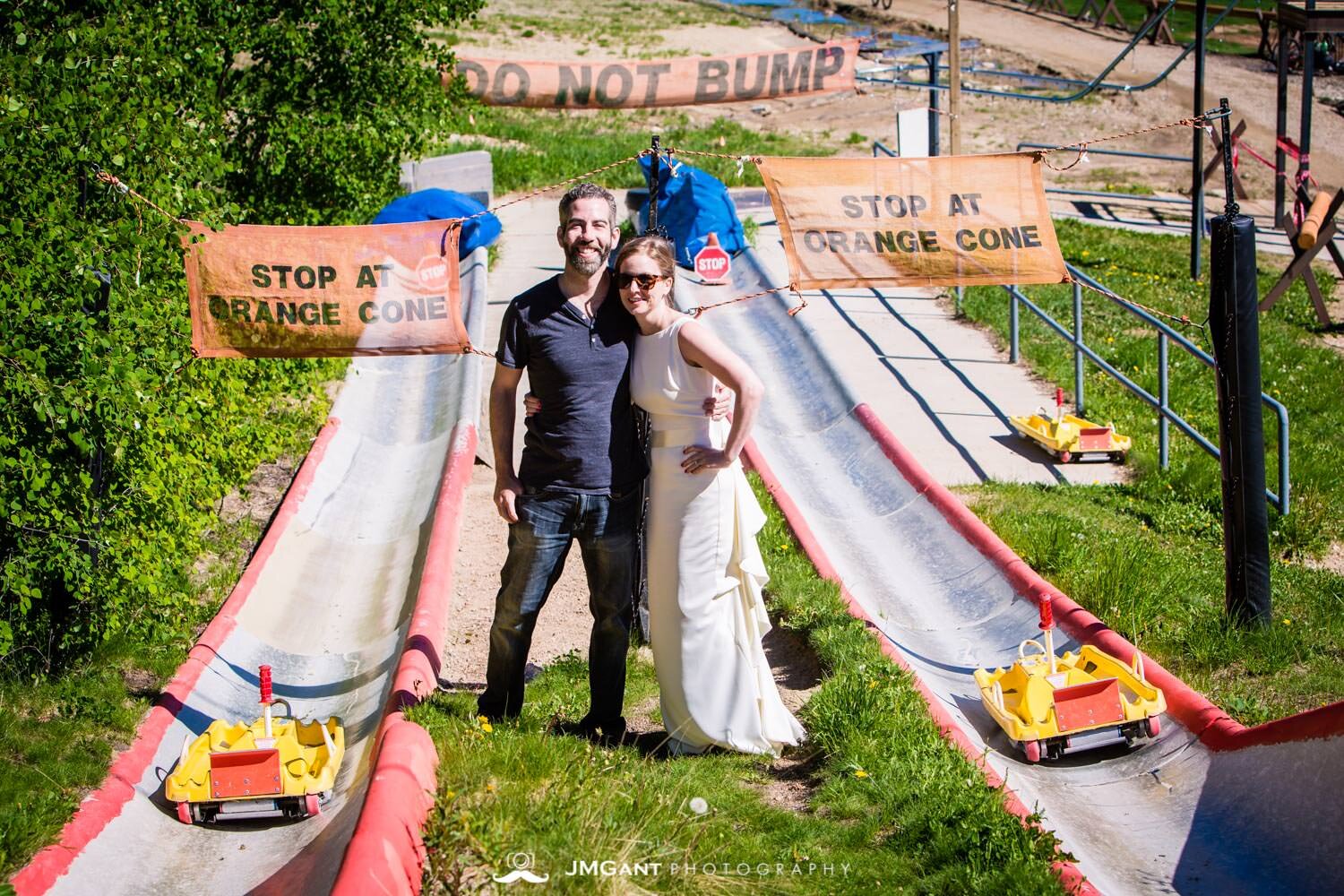  Bride and groom riding down the Winter Park Alpine Slide.&nbsp; 