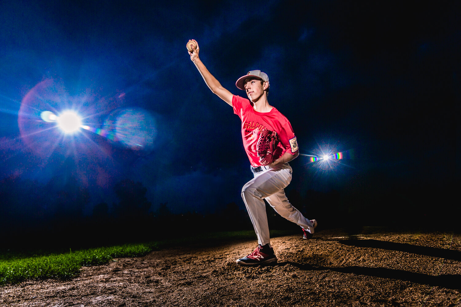  High school senior portraits of baseball player pitching the ball.&nbsp;  www.jmgantphotography.com 