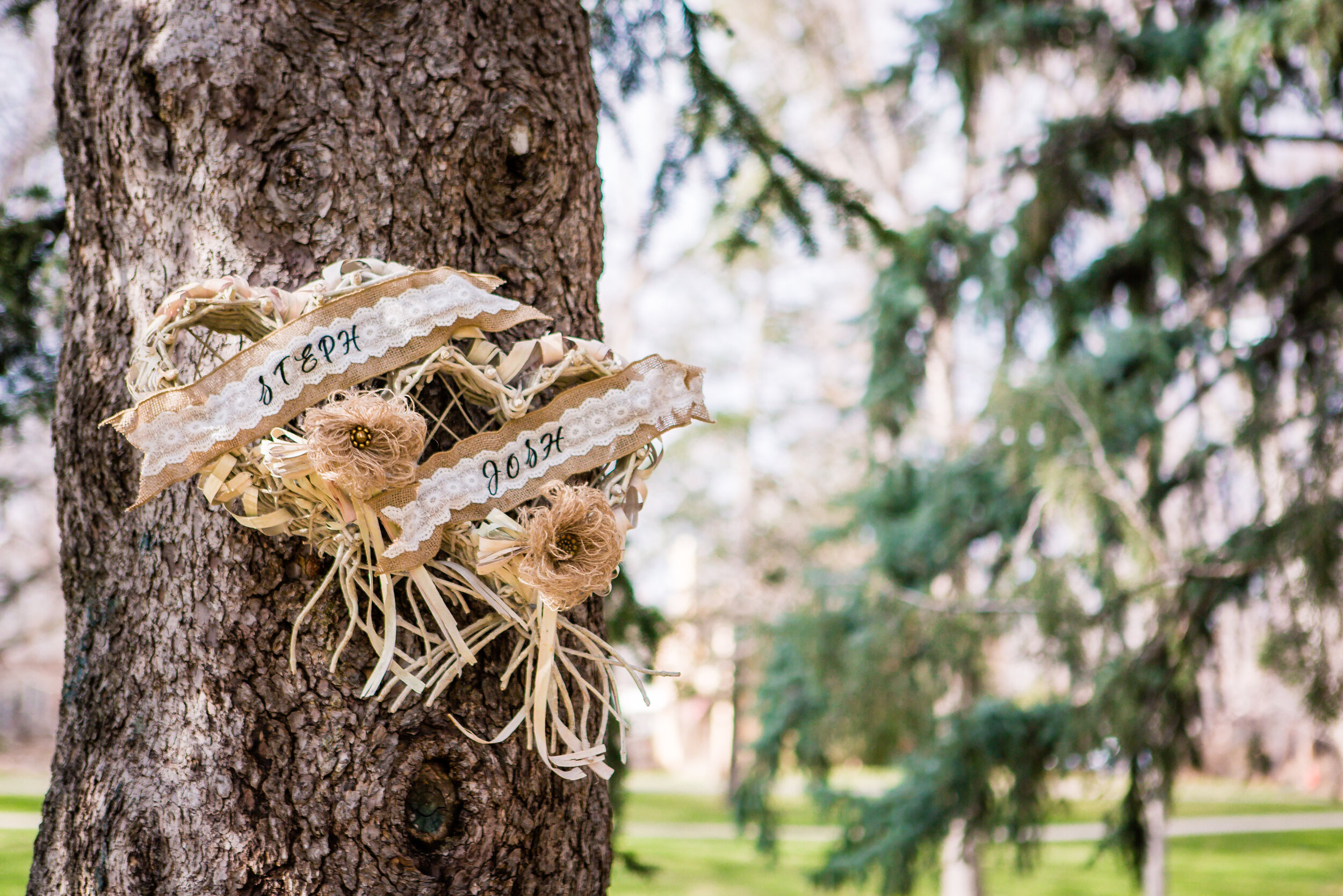 wedding details hanging from tree