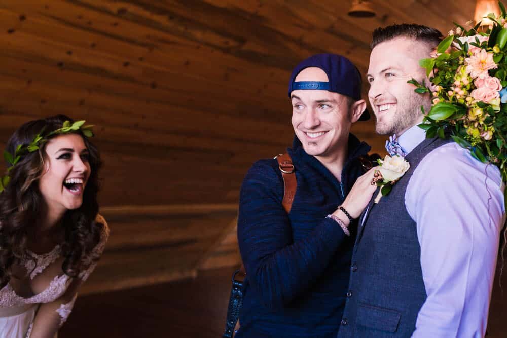 Jared Gant teaching a bride how to pose.jpg