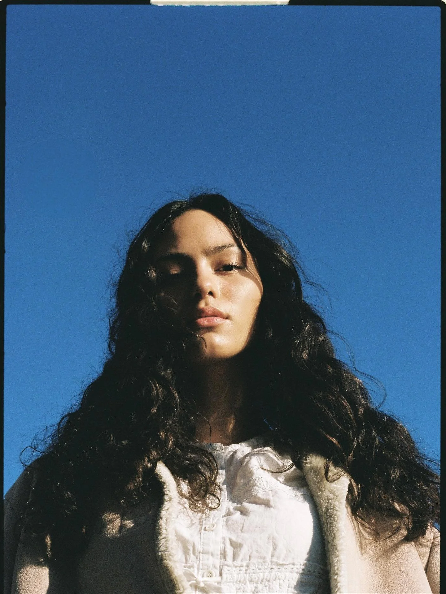 Sometimes I choose to get my film scans with boarders, but mostly without. Sometimes it makes a nice little frame. I like the contrast of the edges here against the blue sky. 

Shoot with @gabriellemurphyy @frmmodels 

Scanned &amp; developed @bayou_