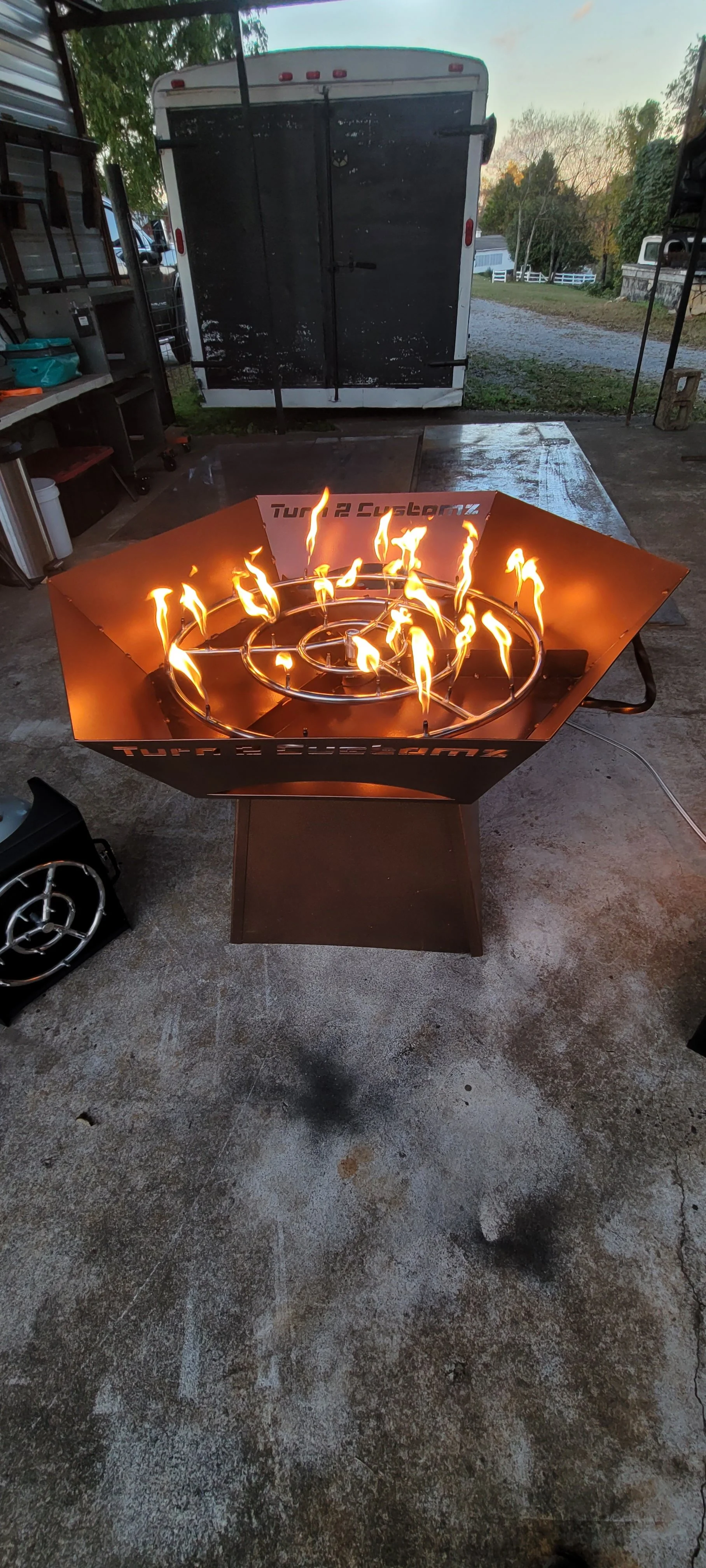 Small custom propane fire pit fabricated from steel by Turn 2 Customz in Tellico Plains TN