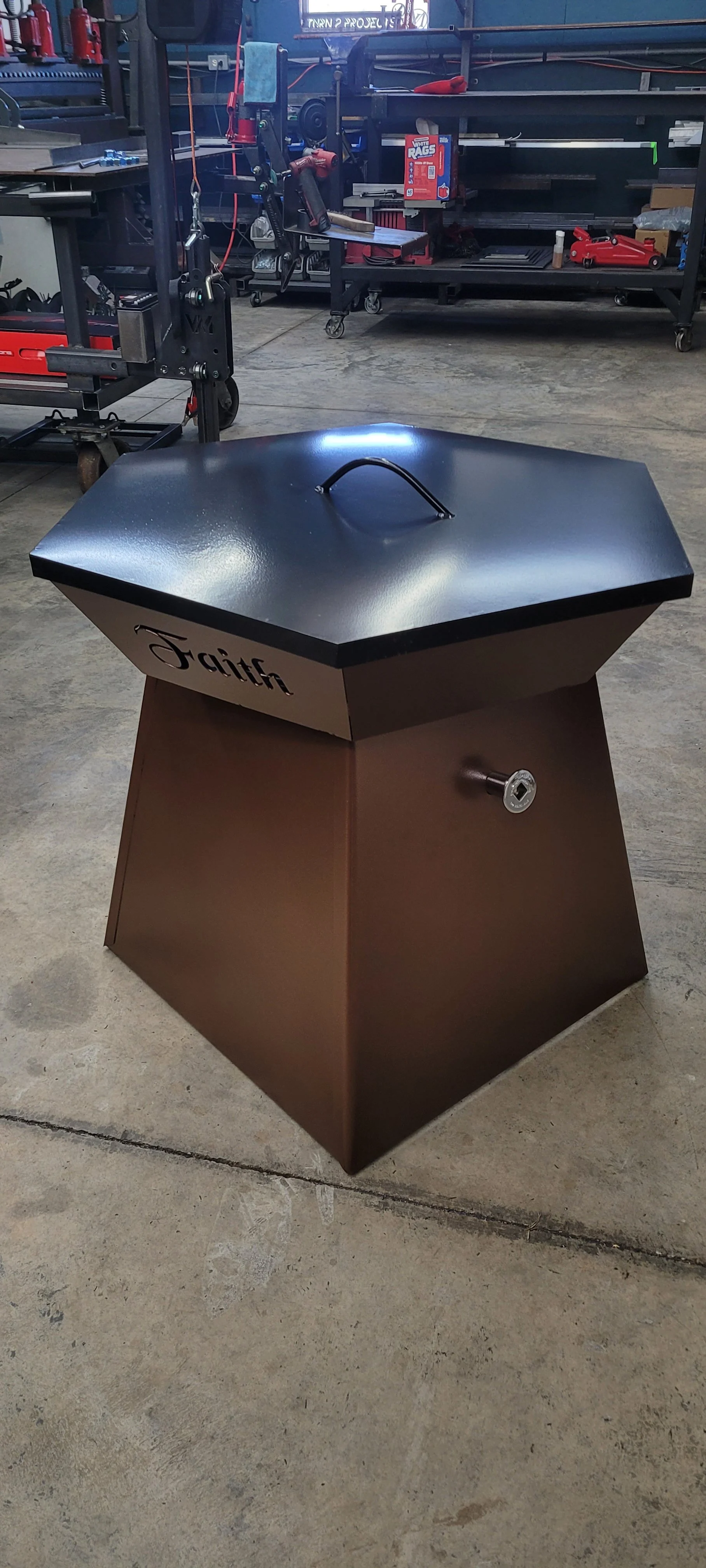 Small custom propane fire pit fabricated from steel by Turn 2 Customz in Tellico Plains TN