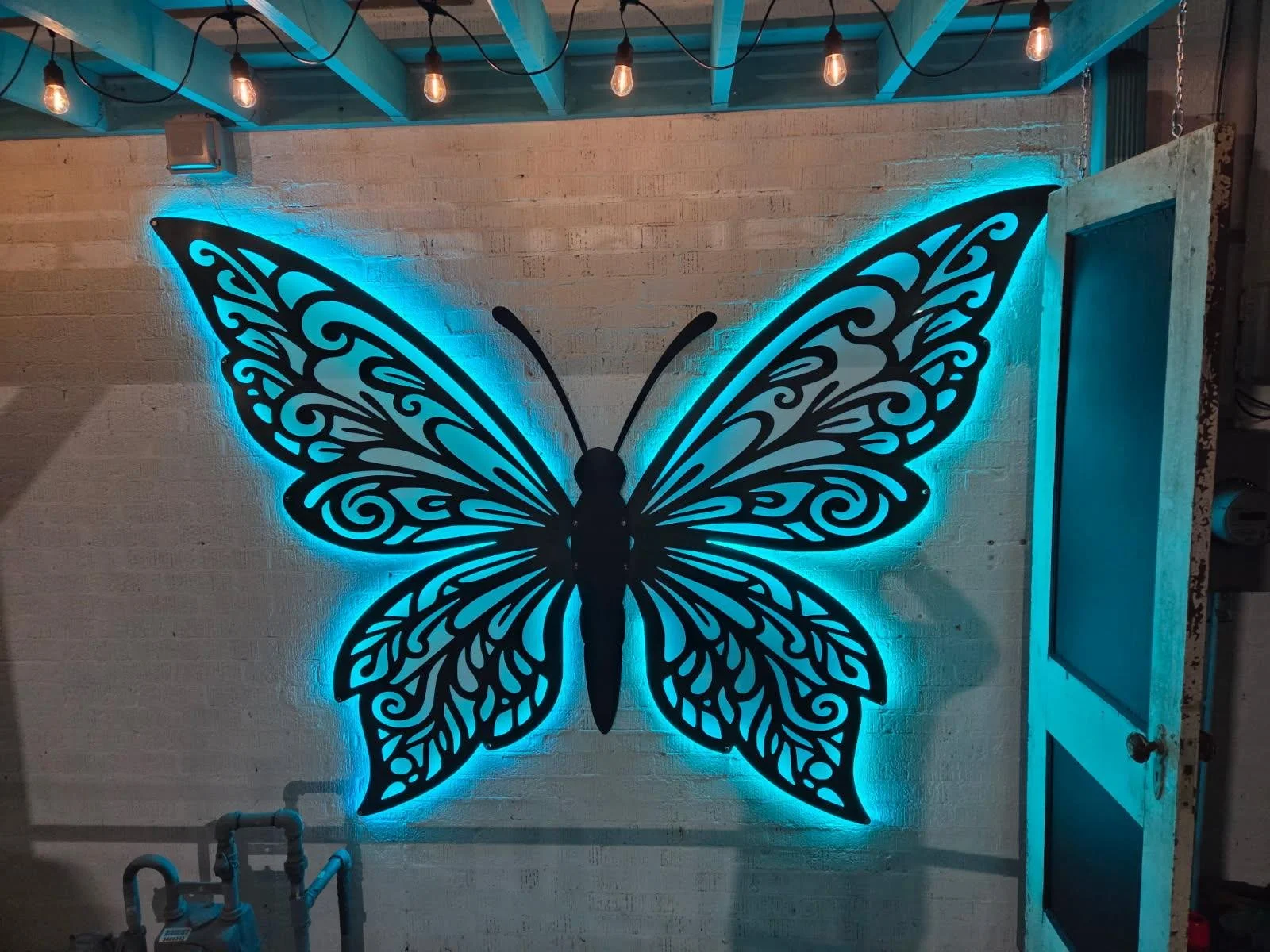 metal butterfly wings plasma cut and backed with acrylic and backlit with leds by Turn 2 customz