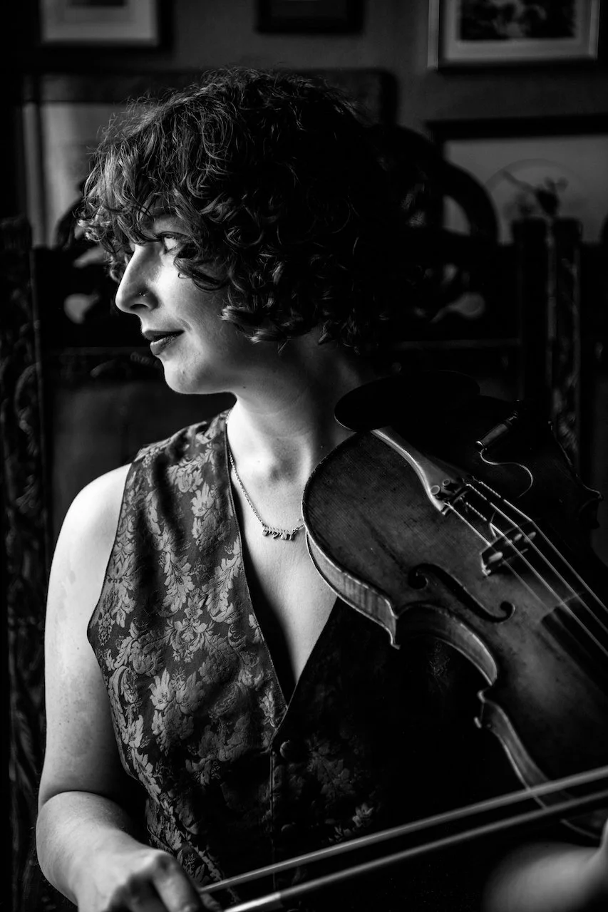 Headshot lighter smaller.jpeg