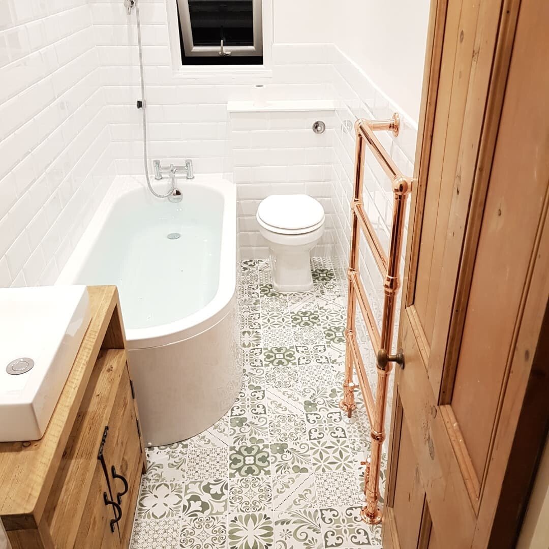 Earthy, clean &amp; bright. Reclaimed timber vanity, hand made copper roll holder, towel ring &amp; curtain track. #greensbathrooms #bathroominspiration #sheffield #tiles