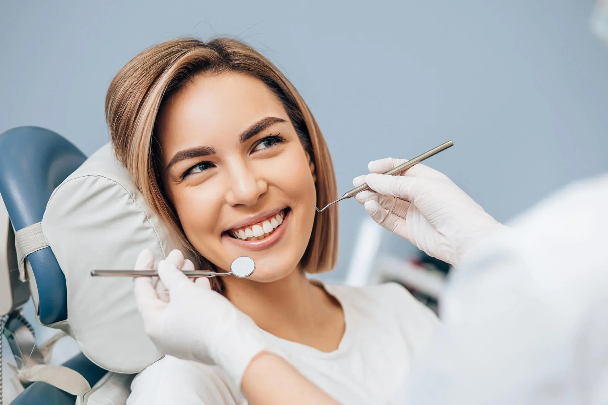 Smiling woman after smile makeover in Panama City.