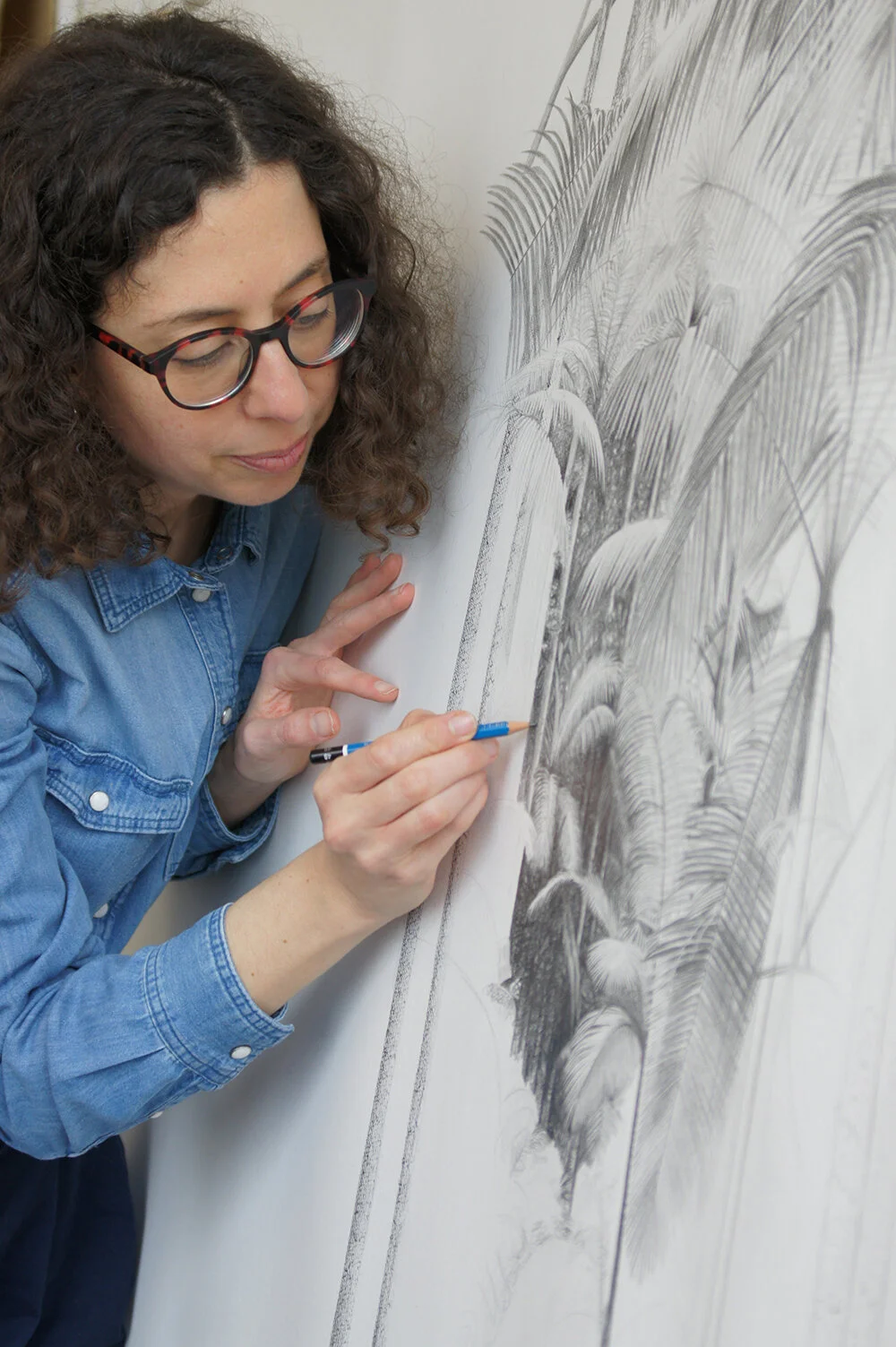 The Artist Judit Prieto drawing on her studio.
