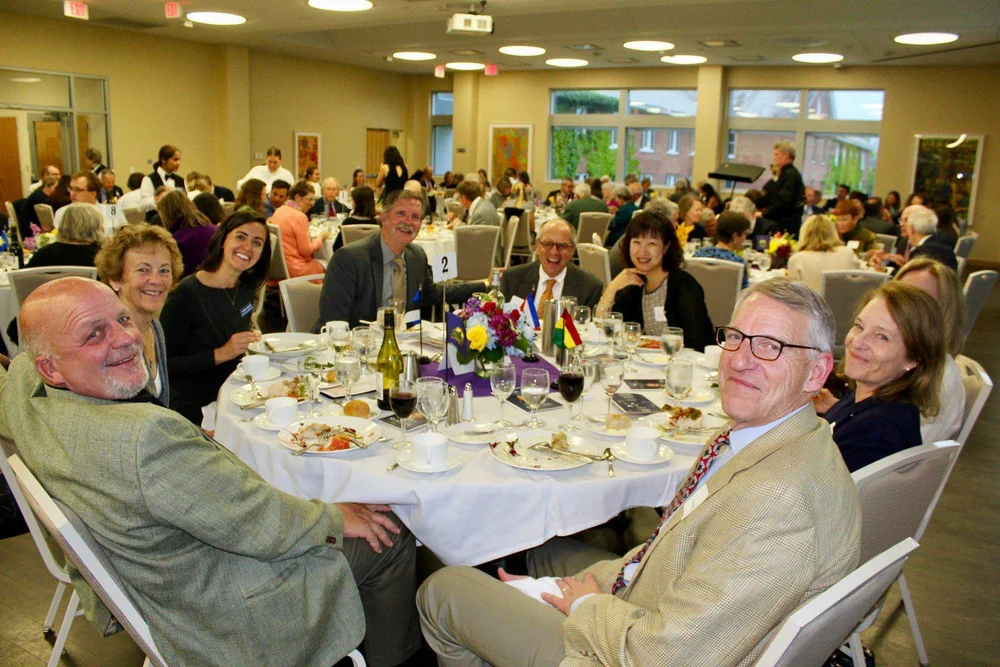 People gathered at a VCWA community event