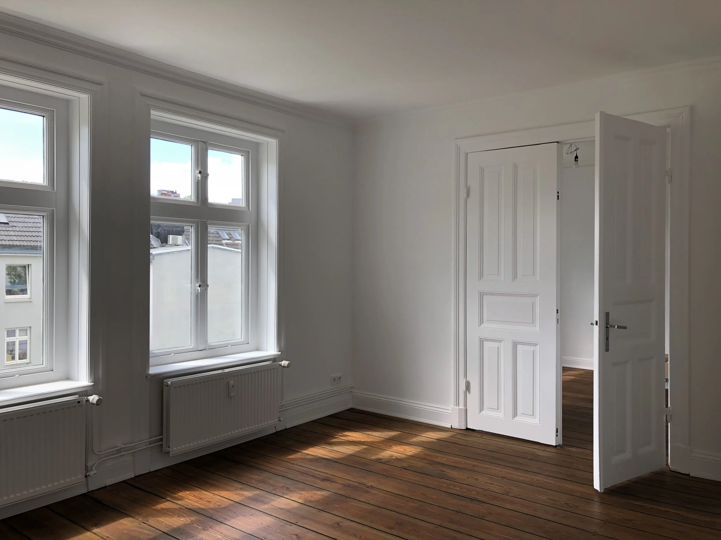 Innenarchitektur Altbau Hamburg Restauration Dielenboden Holztüren elegant