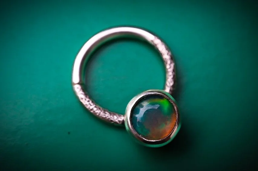 New opal septum just dropped! Handmade by yours truly - I&rsquo;ve been having a lot of fun working with tiny stones lately. Any special requests while I&rsquo;m on a roll? Let me know in the comments! FYI these also look so cute stacked in ear lobes