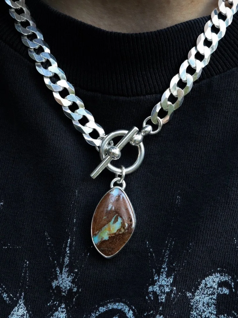 A closer look at this Boulder opal necklace! Such a beautiful stone that I&rsquo;ve had hoarded in my collection for quite some time. It feels so good to finally see it set in a piece of jewelry. 🖤
.
.
.
.
.
.
.
#handmadejewelry #handcraftedjewelry 
