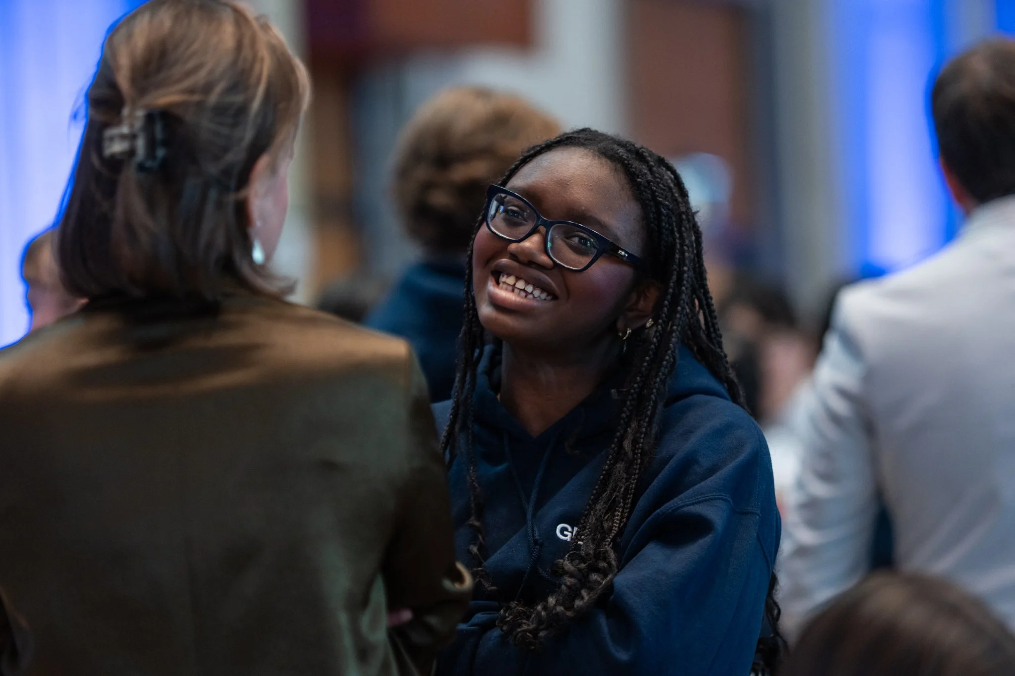 Participants networking during the coffee break