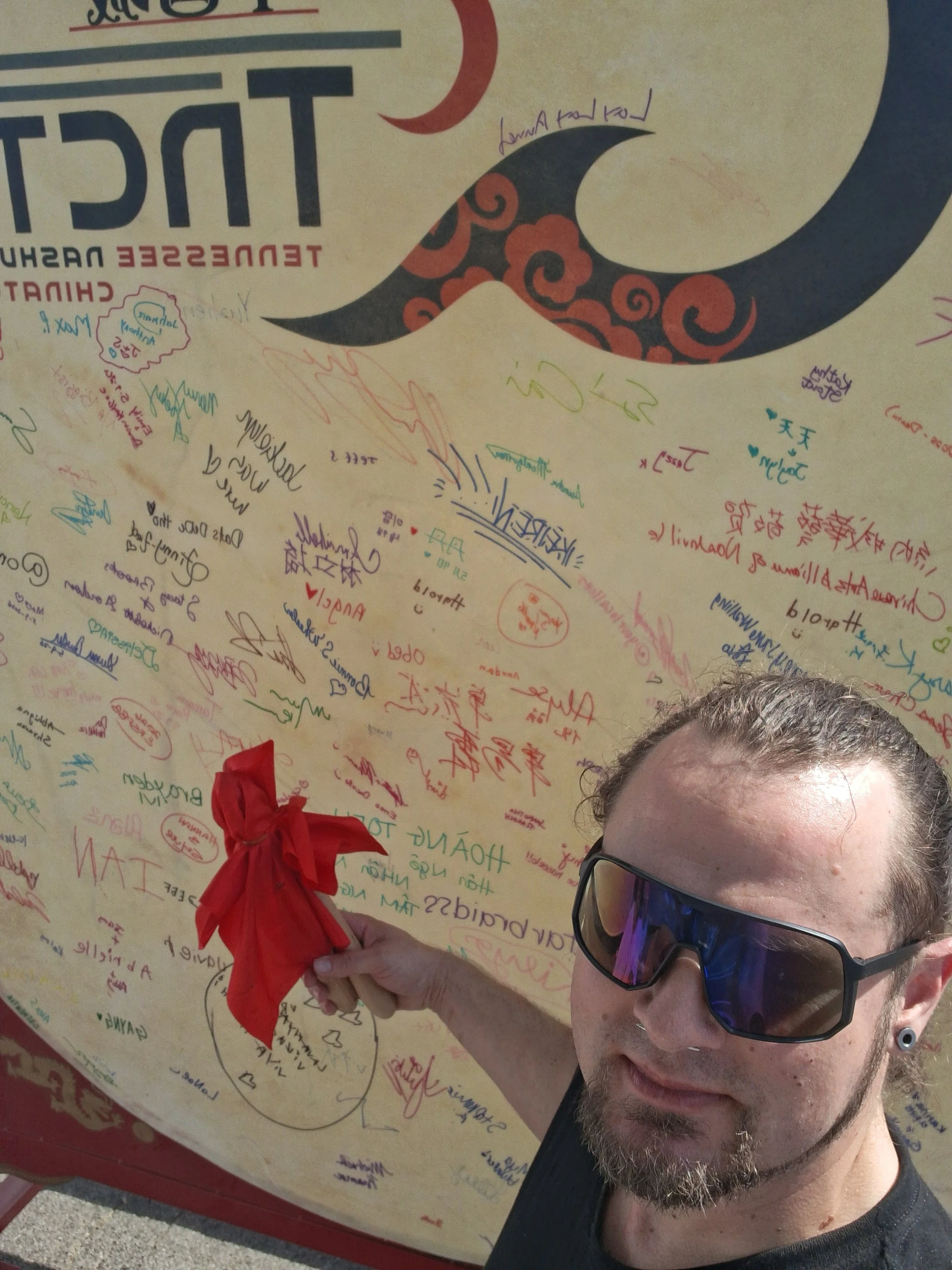 Brad Crane Nashville TN Feng Shui Consultant at the Spring Festival striking Nashvilles largest drum