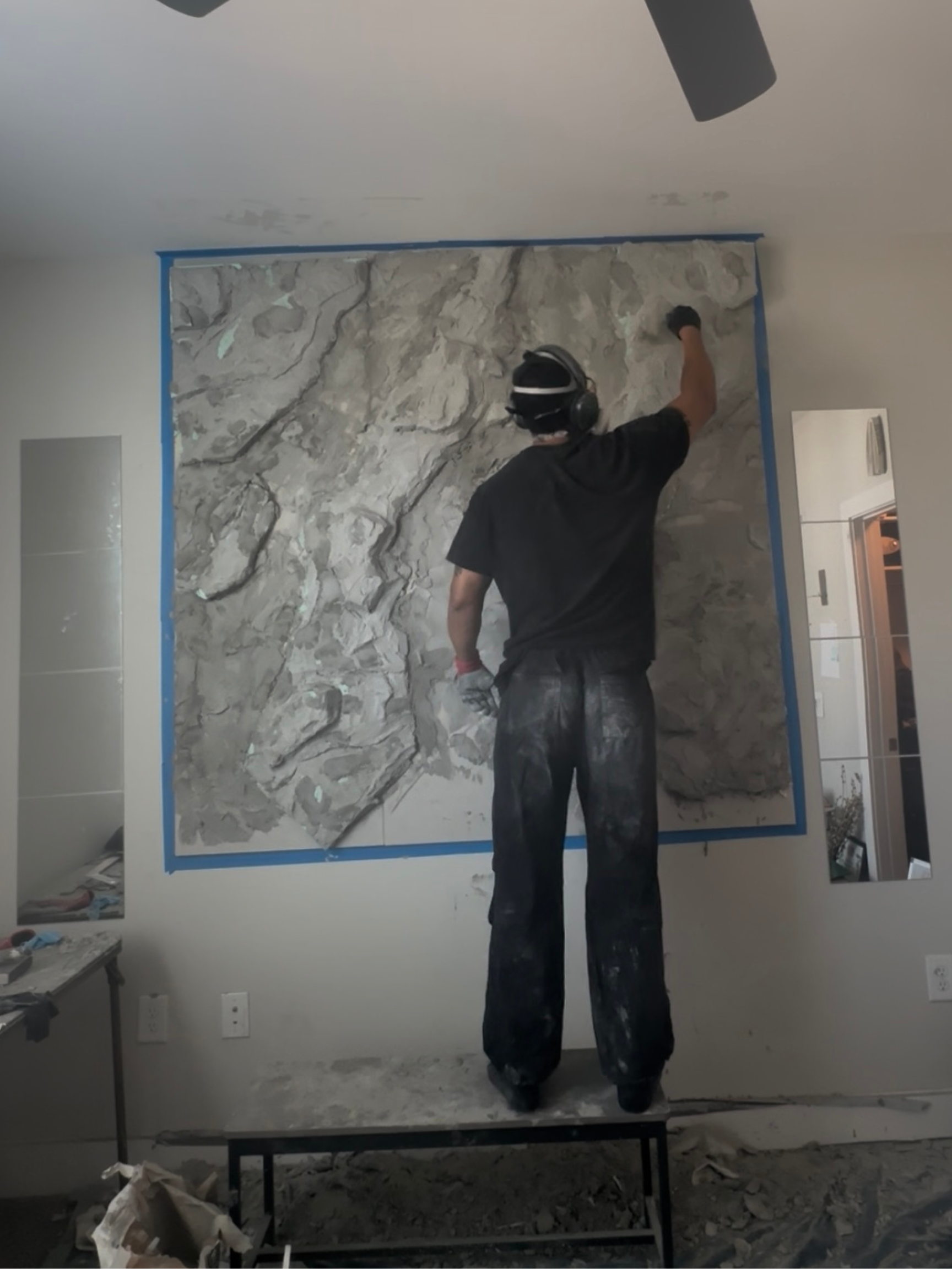 This installation commands attention above the bed