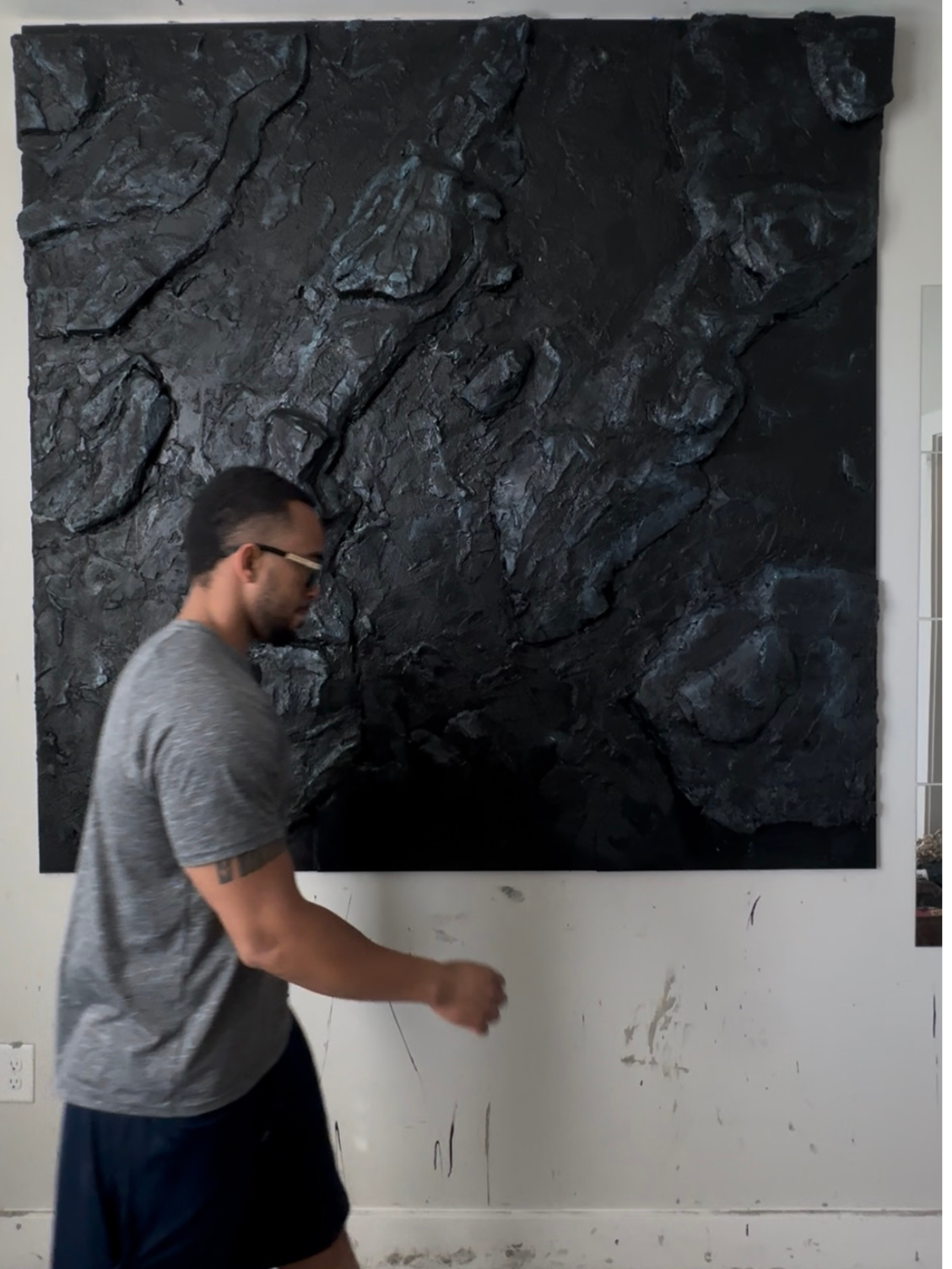 Its textured and dark surface creates a luxurious and captivating focal point.