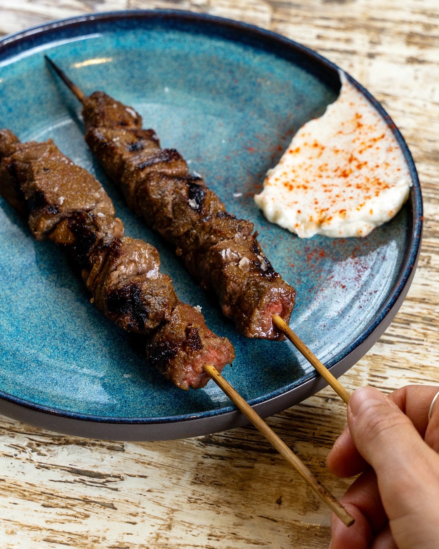 Cumin &amp; Aleppo Beef Skewers with Confit Garlic Toum

Now available for lunch and dinner, the perfect little bite to get the appetite going!